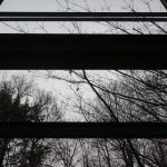 A black-and-white photograph of the view out a window.