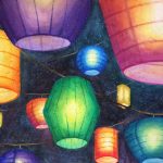 A watercolour painting of multicoloured paper lanterns glowing in the night sky.
