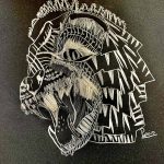 A pencil drawing on black paper of an abstract tiger drawn in shapes.